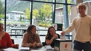 Elev puttar stemmesetel i valurna. Foto: Stryn vgs